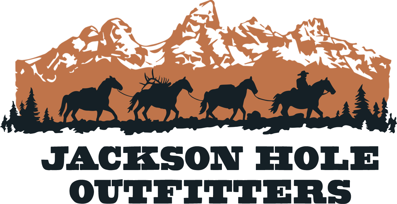 Jackson Hole Outfitters Logo - Horses Packing in front of the Teton Mountains